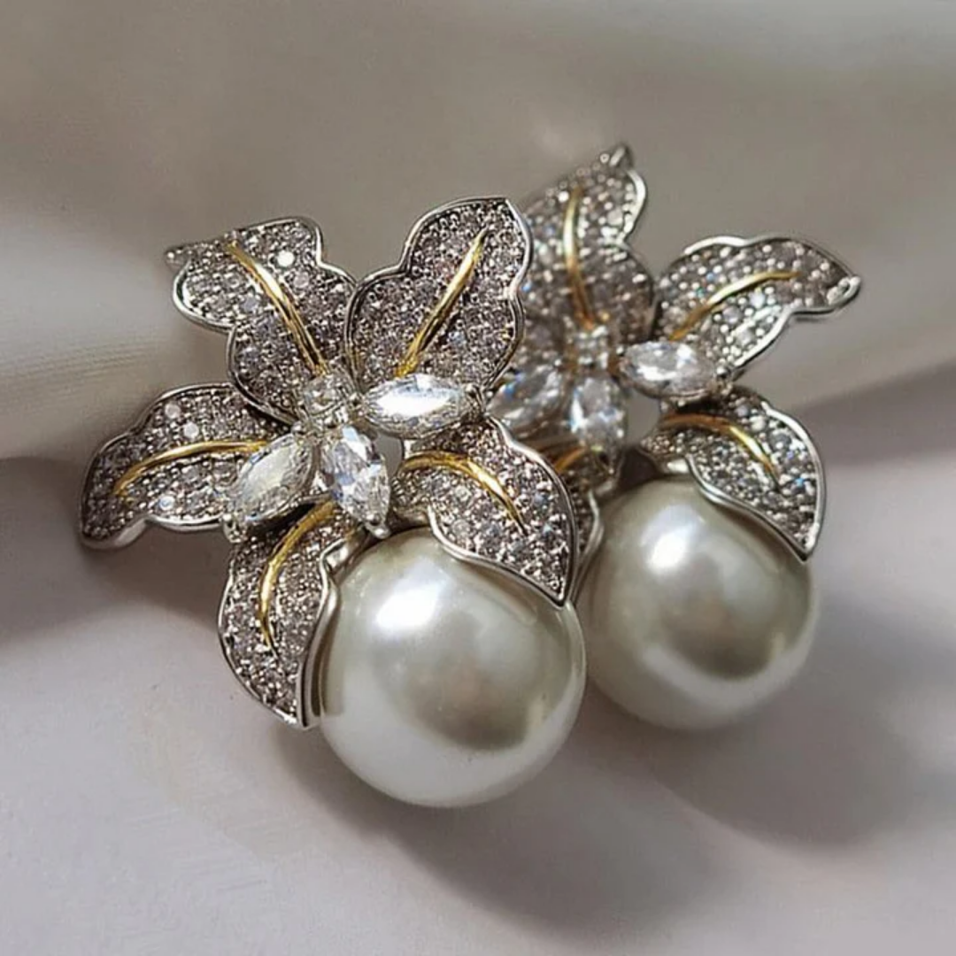 Elegant earrings with flower and pearl