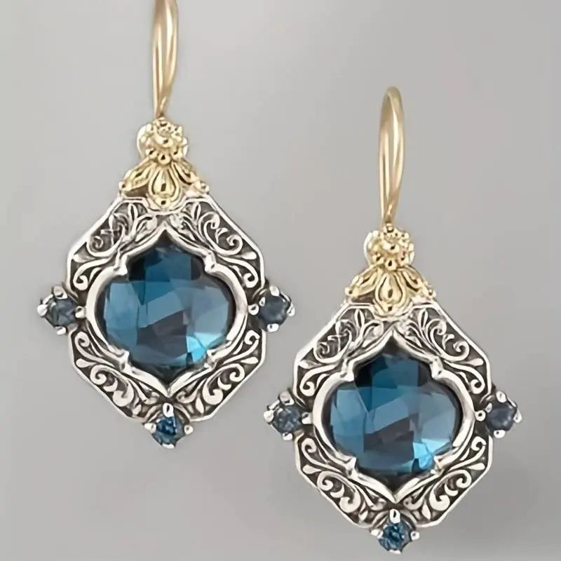 Blue crystal earrings in gold and silver