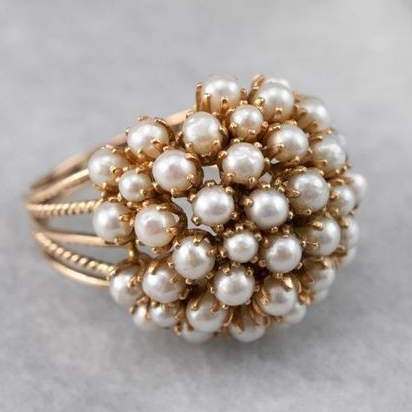 The ring with pearl inserts – 16
