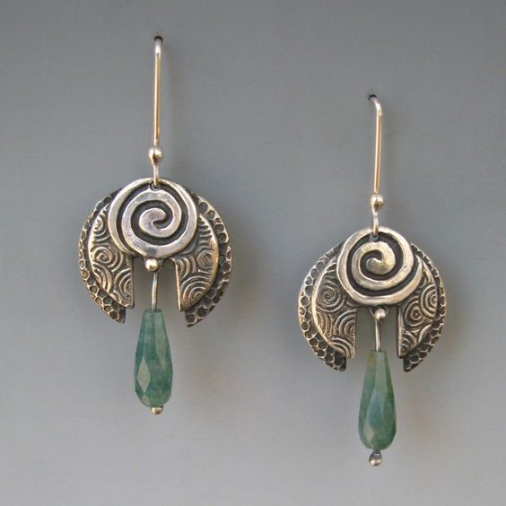 Vintage earrings with hanging green stones