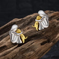 Adéla – Earrings with a dog motif – Gold