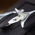 Flower-shaped earrings in silver – image 4