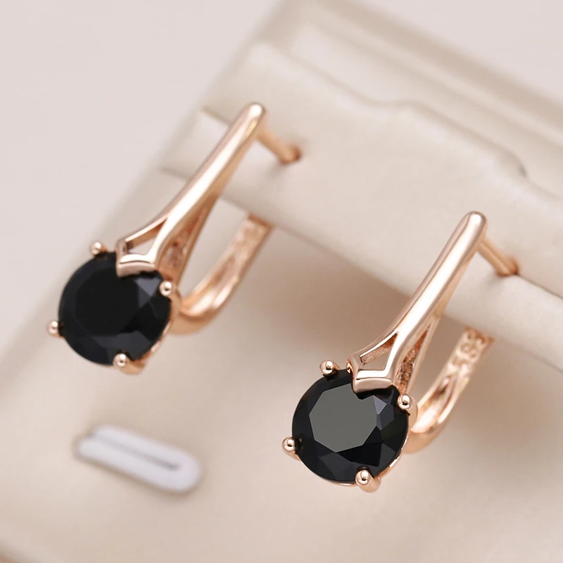 Elegant gold earrings with black zirconia