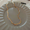 Elegant necklace in gold and silver