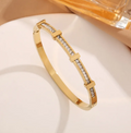 Simple geometric open bangle with two layers of zircon – Silver