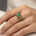 Gold ring with green and blue crystals – 16