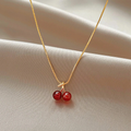 Necklace with cherries in gold