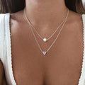 Necklace with silver heart and pearls