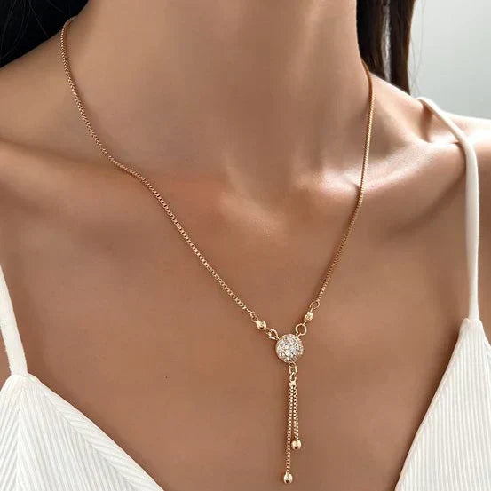 Necklace with vintage gold pendant