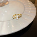 Luxurious adjustable ring with white opal stones in gold – image 3