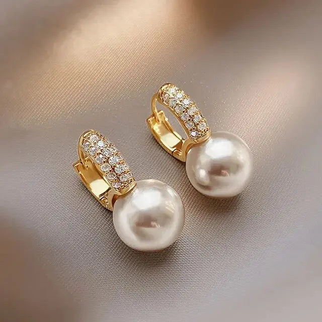Pearl earrings with fringes