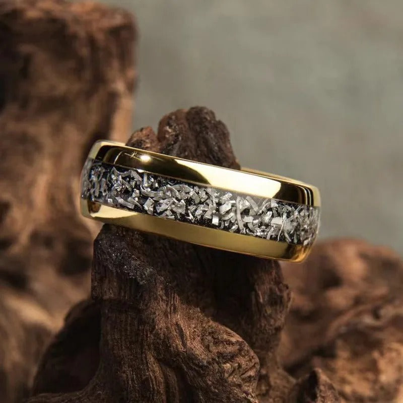 The ring with sparkling gold inserts – 17