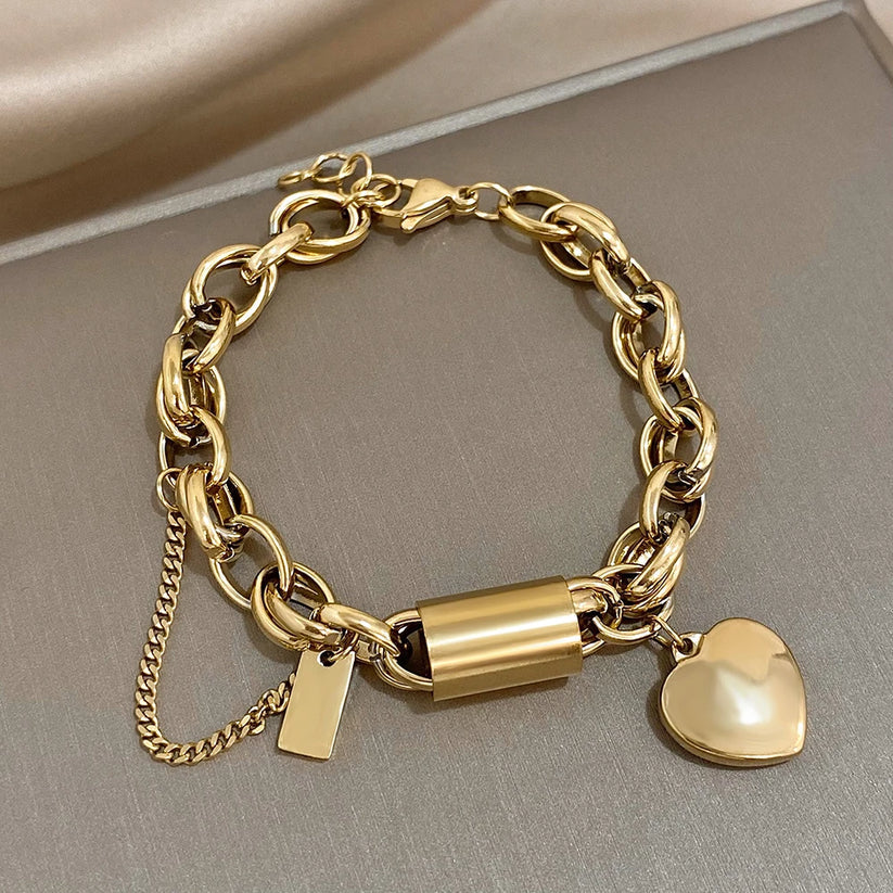Thick heart bracelet in gold – Gold