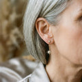 Vintage gold earrings with crystal star – image 2