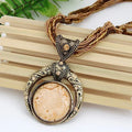 Vintage necklace with ethnic pendant of green crystal – Grey