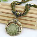 Vintage necklace with ethnic pendant of green crystal – Green