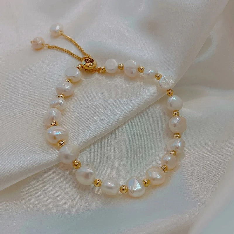 Vintage white bracelet with pearls and gold