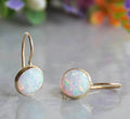 Vintage earrings in gold with opal stones