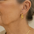 Vintage earrings with flower in gold – image 2