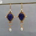 Vintage earrings with ruby ​​and pearl – image 4